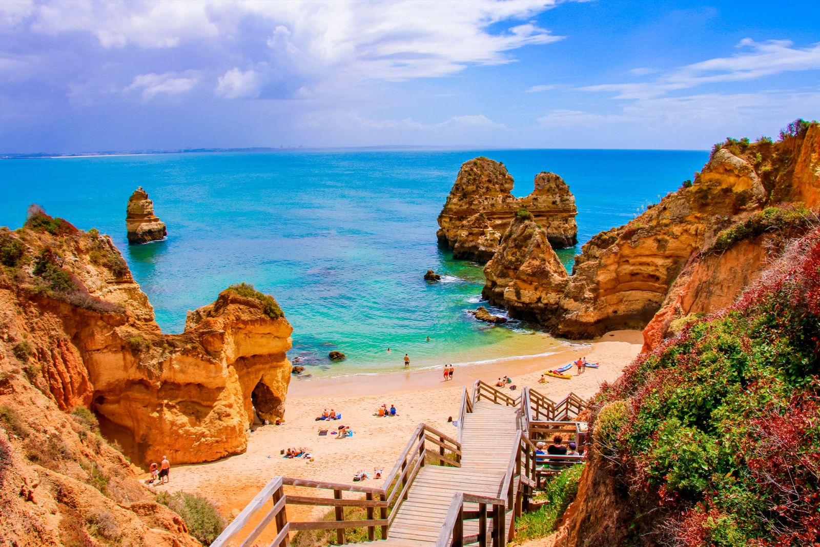 Algarve beach in earlier hours of a summer day.