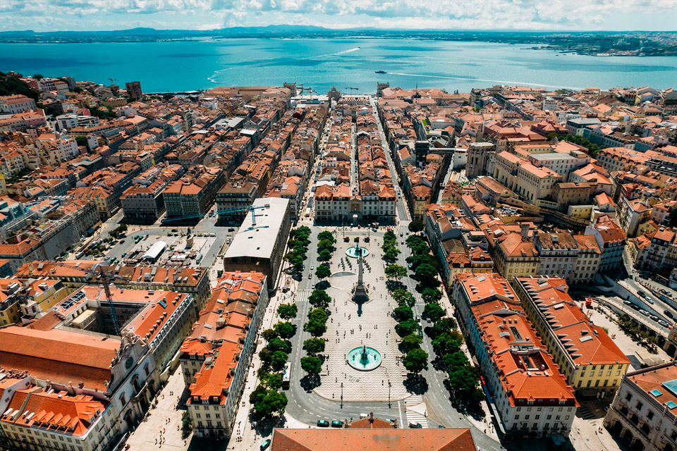 Lisbon Portugal Downtown Riverside Overview with Traditional Buildings.