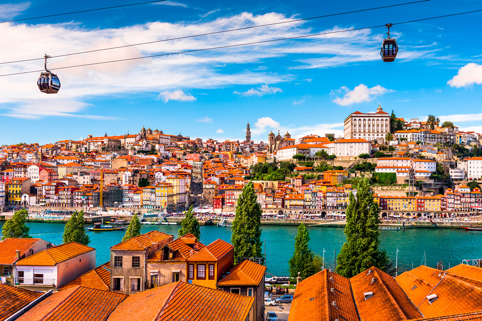 Sunny Porto, Portugal - Riverside Overview with Traditional Buildings.