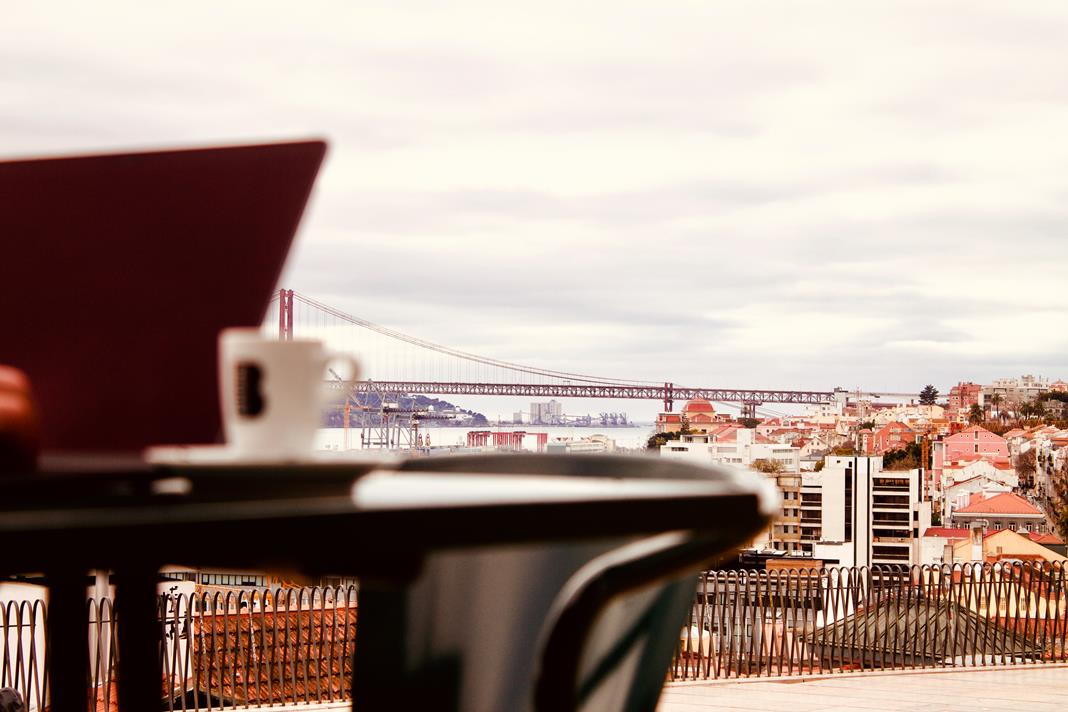 Enjoying coffee and working remotely from one of Lisbon's famous viewpoints.